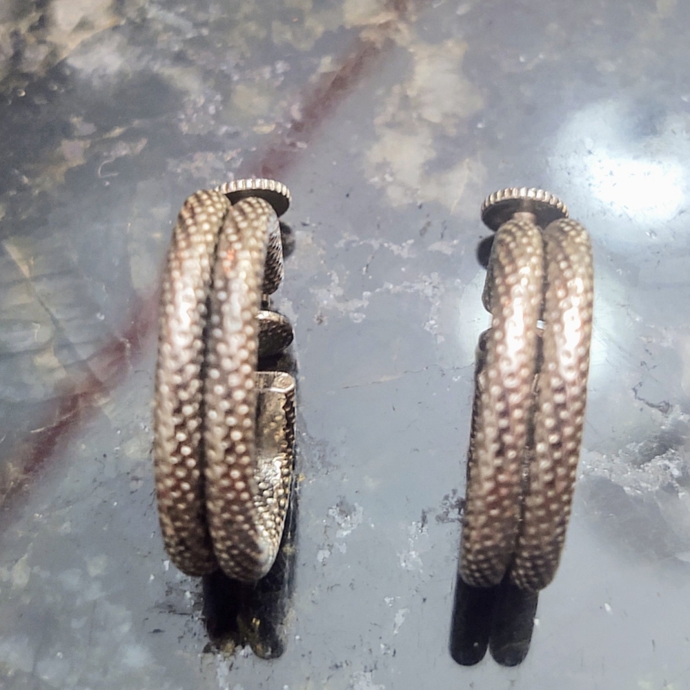 Silver toned earrings signed Sperry . Vintage and